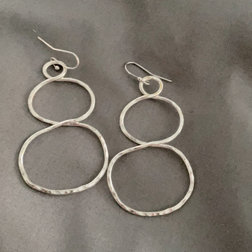 Brand new silver ear rings